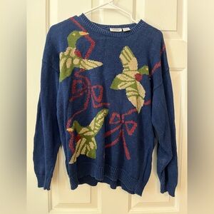 Vintage knit sweater. Navy blue with ducks and bows. Petite size Large.